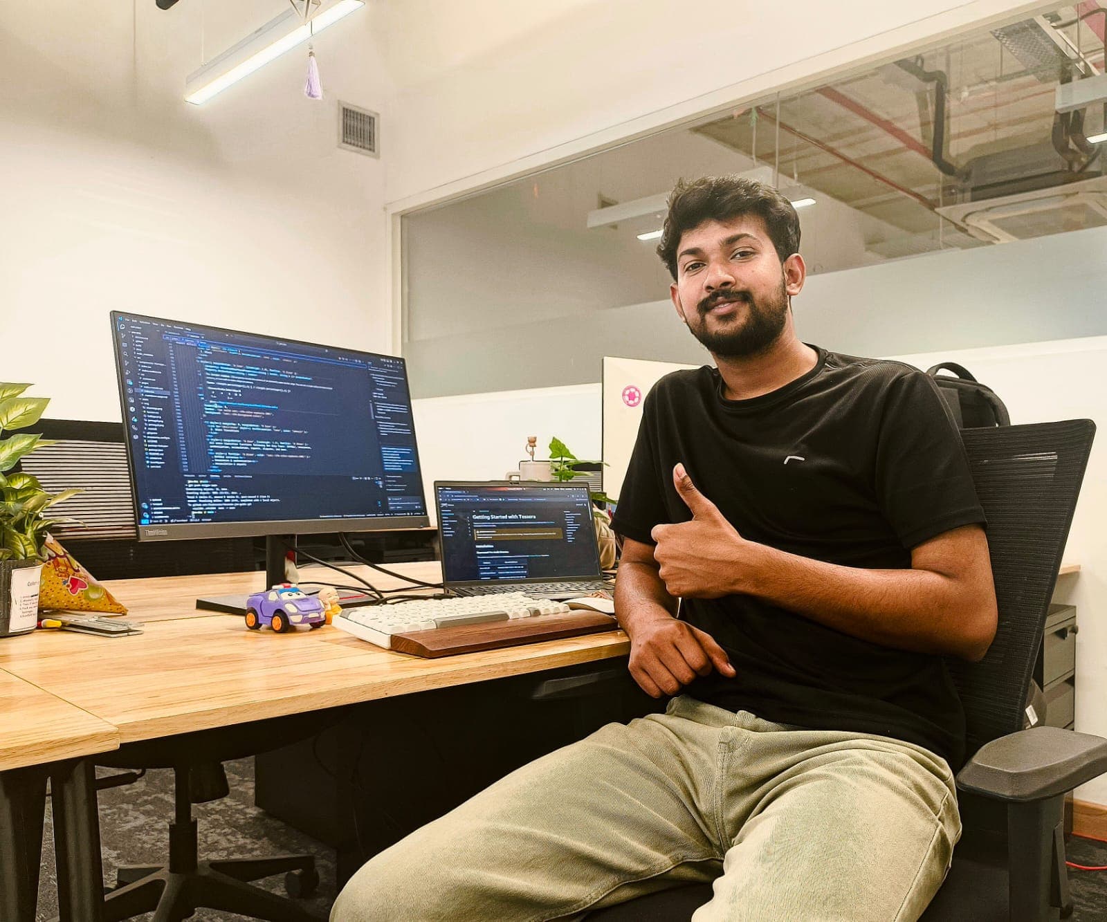 Working at desk with multi-screen setup